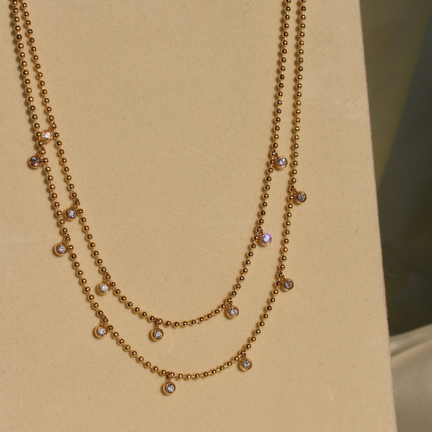 layered zirconia gold plated 18k stainless steel