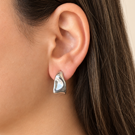 Waterproof silver structured hoop earring wavy hammered design