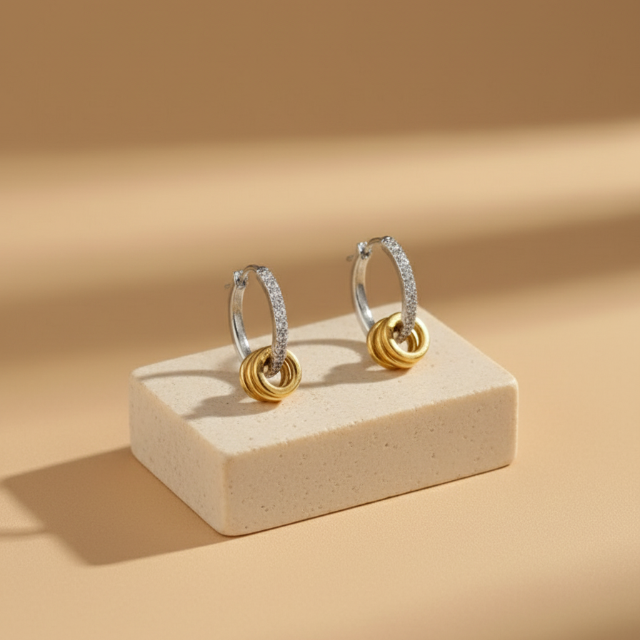 Pair of gold and silver hoop earrings 