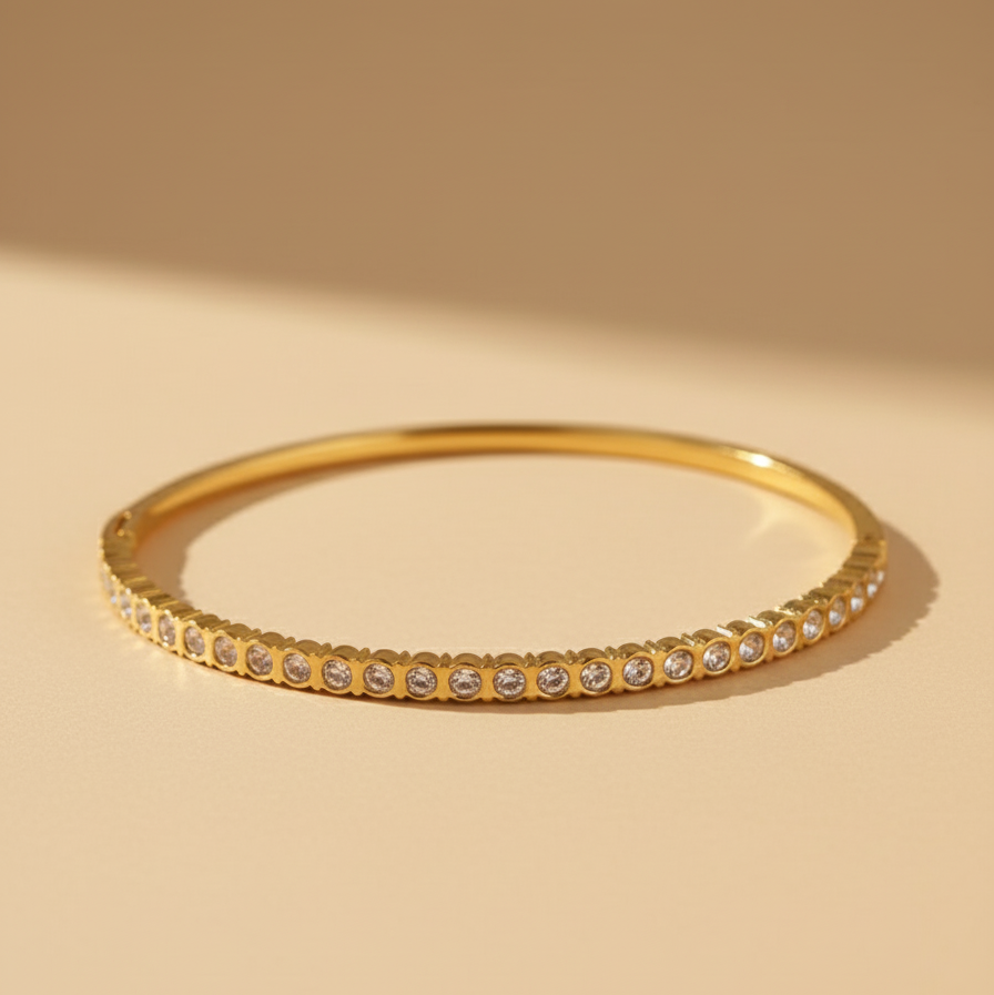Gold bracelet with small stones