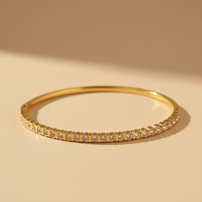 Gold bracelet with small stones